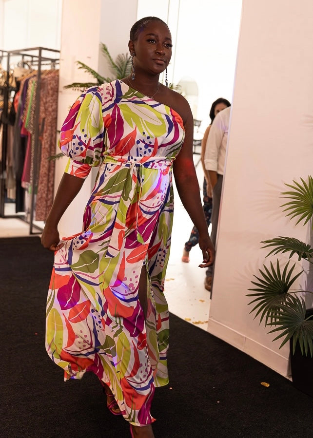 Multicolored asymmetrical long dress with side opening and mini skirt