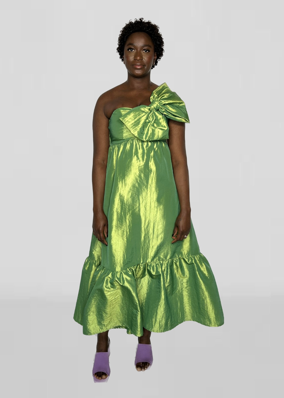 Long asymmetrical green dress with detail